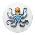 Elevate your dining experience with our round vinyl placemat featuring a captivating octopus design, inspired by Portuguese ceramic artistry. These placemats boast bold colors. Bring a touch of maritime charm to your table setting.