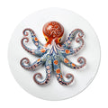 Elevate your dining experience with our round vinyl placemat featuring a captivating octopus design, inspired by Portuguese ceramic artistry. These placemats boast bold colors. Bring a touch of maritime charm to your table setting.