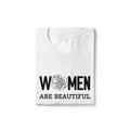 Unisex white t-shirt from the International Women's Rights Day collection with the message Women are beautiful in black font and black & white flower pattern. Fitted 100% cotton T-shirt with a strong feminist message to contribute to the fight for gender equality. Expressing your convictions is already a first step in this fight and in a stylish way.